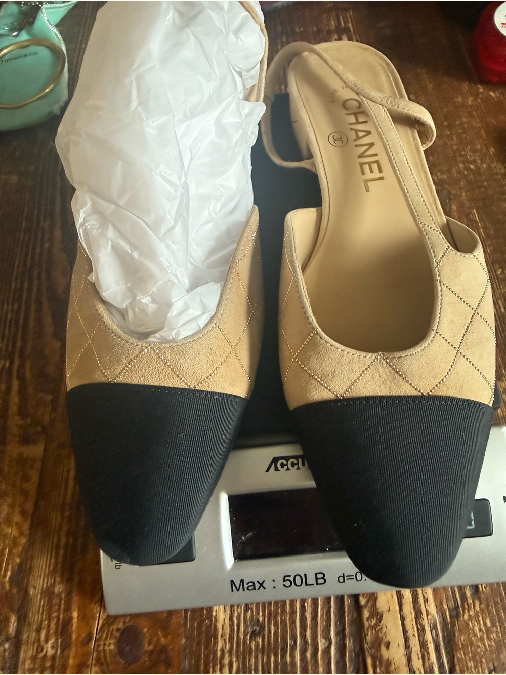 CHANEL Beige Quilted Slingback Flats with Black Cap Toe
